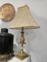 A pair of ornate table lamps with marble to column, with cream silk embroidered shades