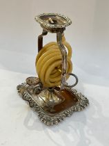 An early 19th Century Wax Jack (wax dispenser)