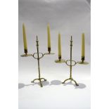 A pair of 19th Century twin sconce adjustable height brass table candlesticks with tripod paw feet