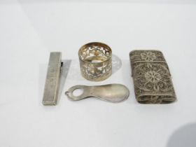 A 925 silver miniature shoe horn, filigree case, plated peg note holder and plated napkin ring.