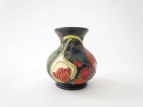 A Moorcroft Queen's Choice pattern vase, designed by Emma Bossons, 9.5cm tall