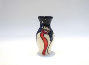 A Moorcroft miniature Snowman pattern vase, 5.5cm tall