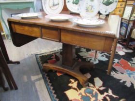 A late Regency / William IV mahogany drop-flap sofa table, 69.5cm x 92cm x 66.5cm