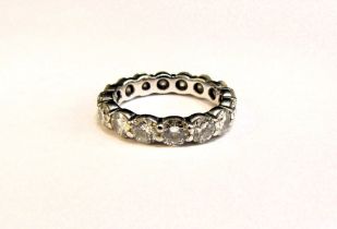 A white gold diamond eternity ring, 3ct total approx, unmarked. Size N, 3.6g