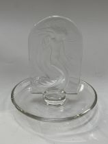 A Lalique Glass dressing table ring dish with upright panel of 'Naide' design with nude female, 10cm