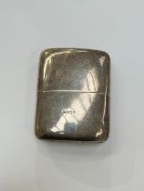 A silver hipflask with cover cap top, Birmingham 1938, 10.5cm x 7.5cm, 161g