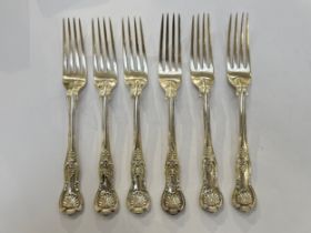 Six large silver King's pattern dinner forks, three with Lions crest and one with flame crest.