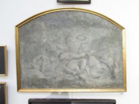 A sectional grey monotone painting of cherubs in gilt domed frame, watercolour, water damage