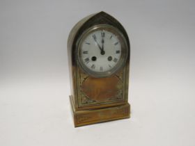 A late 19th Century French Arch form mantel clock, 27cm tall x 15cm x 11cm