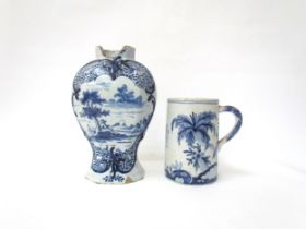 Two 19th Century or earlier Delft items, tankard with armorial crest, 14cm high, vase with figural