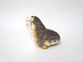 A Royal Crown Derby paperweight as a Walrus, gold stopper