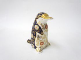 A Royal Crown Derby paperweight as a Platypus Duck, gold stopper