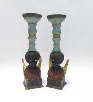 A pair of 19th Century ornate pricket candlesticks with winged Angel bodies, 48cm tall