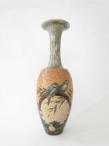A Royal Doulton vase decorated with birds, branches and leaves with imperfections to the base,