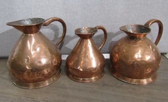 A Victorian two gallon jug, another similar sized and a one gallon jug, 32cm x 28cm & 26cm tall