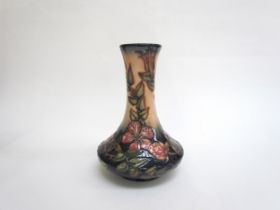 A Moorcroft Sweetbriar pattern vase, 21cm tall