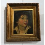 FOLLOWER OF WILLIAM OWEN (1769-1825): An oil on canvas portrait of boy, white collar, 25cm x 20cm,