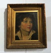 FOLLOWER OF WILLIAM OWEN (1769-1825): An oil on canvas portrait of boy, white collar, 25cm x 20cm,