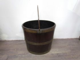A 19th Century bentwood bucket with brass banding, 32cm high