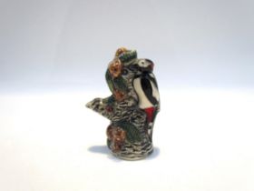 A Moorcroft miniature Greater Spotted Woodpecker, 7cm tall