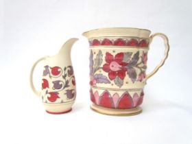 Two unmarked/stamped Charlotte Rhead jugs both for Crown Ducal, one with Persian Rose pattern the