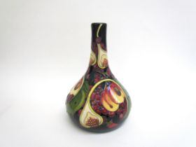 A Moorcroft Queen's Choice pattern vase with slender neck by Emma Bossons. Second, 28cm tall