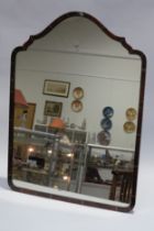 A 19th Century tortoiseshell framed free-standing mirror, some deterioration to the mirror plate,