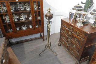 A Victorian floor standing oil lamp converted to electric, copper and brass lamp top, or copper