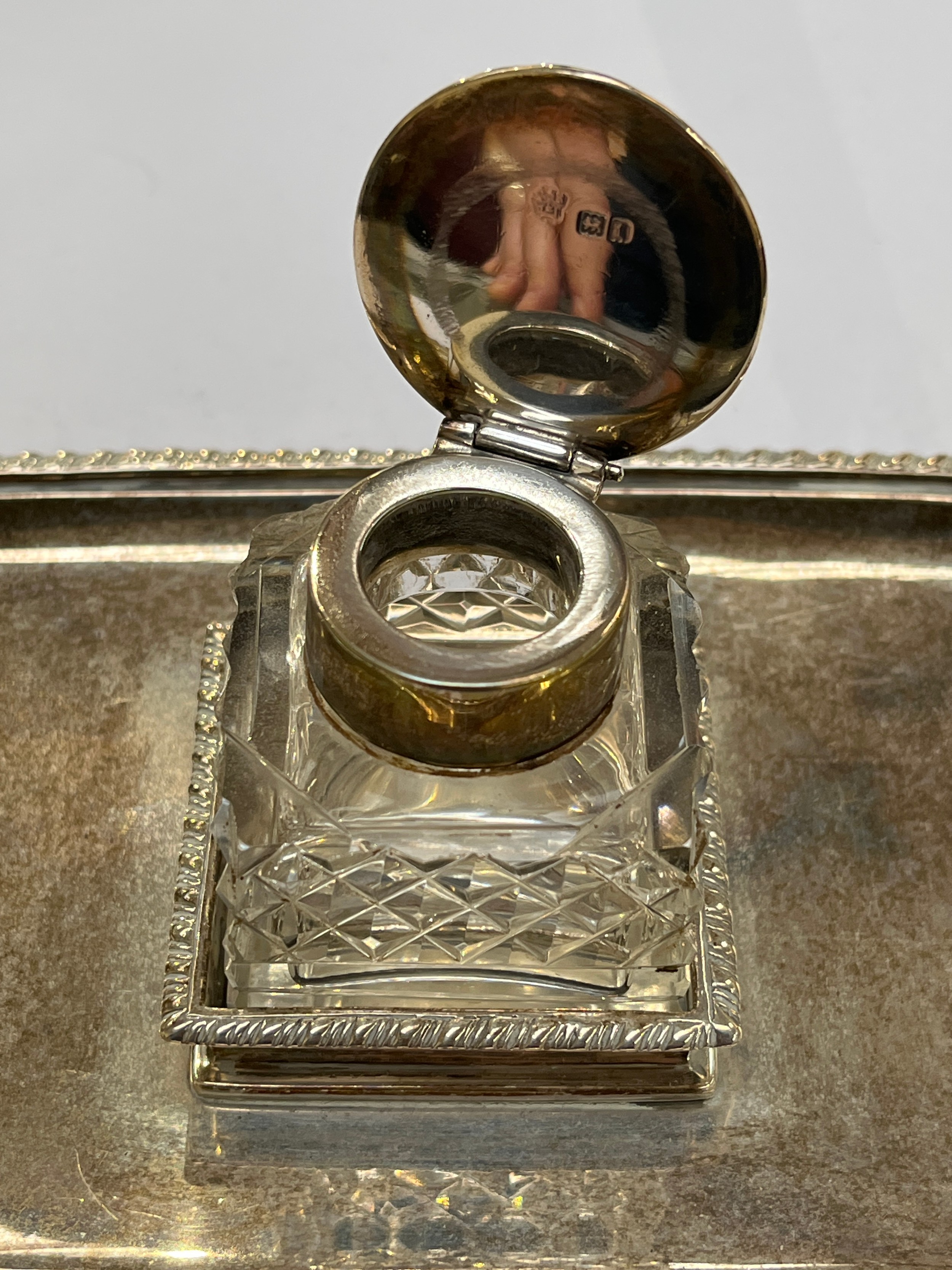 An Edwardian silver desk stand, twin handle, gadrooned border, central inkwell, raised on feet, - Image 2 of 3
