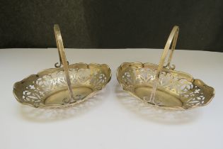 A pair of silver baskets from an epergne, Birmingham 1911, 82.9g