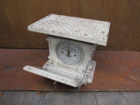 A set of cast metal Jaraso personal weighing scales