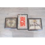 Two Oriental metal embroidered pictures depicting an exotic bird surrounded by clouds and the