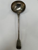 A Chawner & Co (George William Adams) silver soup ladle, reeded detail, emblem of arm holding a