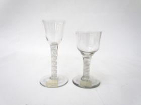 A double cotton twist cordial glass with rounded funnel bowl, 13cm tall, c.1760. An opaque twist