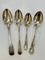 Three silver serving spoons together with a silver dessert spoon. Various makers and dates, 285g