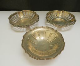 A pair of silver pierced bonbon dishes by Henry Marshall & Sons Birmingham, 11cm diameter and