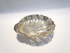 An early 20th Century silver shell-form dish, pierced floral detail, maker indistinct, Birmingham