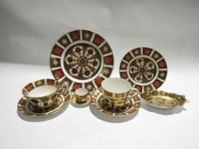 A quantity of Royal Crown Derby Imari palette ceramics to include cups, saucers, plates, pin dish