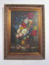 TERENCE ALEXANDER (XX) An oil on canvas, floral still life, classical gilt gesso frame, 90cm x 59.