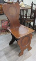 A 19th Century mahogany hall chair with sphere panel detail, 98cm x 44cm x 48cm