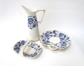 A Charlotte Rhead jug, two leaf form plates and basket dish pattern. TL40 (4)