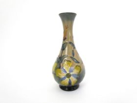 A Moorcroft Hypericum pattern vase, dated '93, 17cm tall