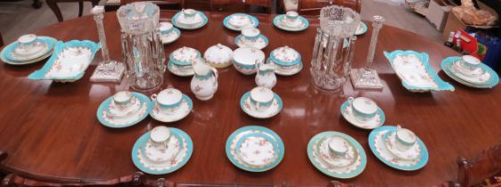 A quantity of Coalport tablewares circa 1845, turquoise bands with floral motifs and gilt