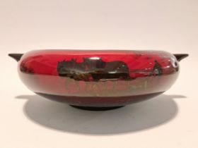 A Royal Doulton flambé twin handled shallow form bowl, 26cm diameter