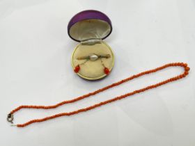 A Victorian brooch set with natural pearl, coral and turquoise and coral necklace a/f (2)