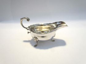 A Haseler Brothers (Edward John Haseler & Noble Haseler) silver sauce boat, scrolled handle, lion