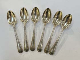 A set of six W. Jenkins silver teaspoons, beaded border, monogrammed handles, Glasgow 1872, 125g