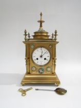 An Aubert & Co Regent Street gilt brass mantel clock with French movement striking on a bell. Pagoda