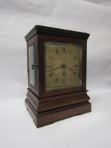 A mid 19th Century rosewood Archibald Haswell London bracket clock, brass dial with black Roman