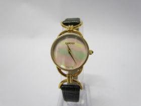 A lady's Gucci mother of pearl face wristwatch